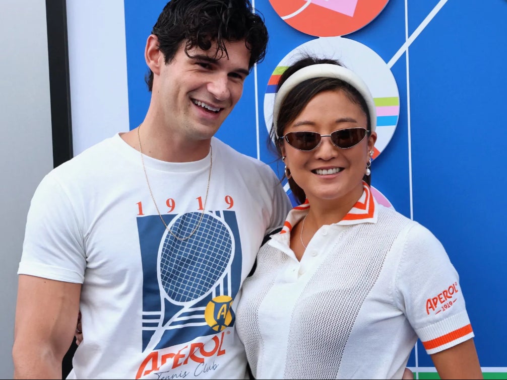 'Emily in Paris' stars and real-life couple Ashley Park and Paul Forman donate Aperol Spritz x US Open products for the tournament