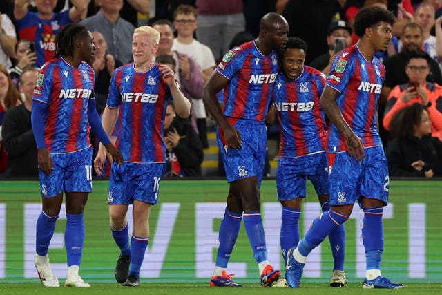 Jean-Philippe Mateta, centre, celebrates with team-mates after scoring Crystal Palace’s second goal against Norwich (Steven Paston/PA)