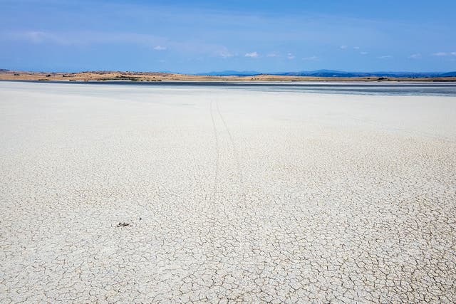 <p>The dried out Lake Picrolimni is seen from above, in the village of Mikrokampos, northern Greece, Aug. 19, 2024</p>