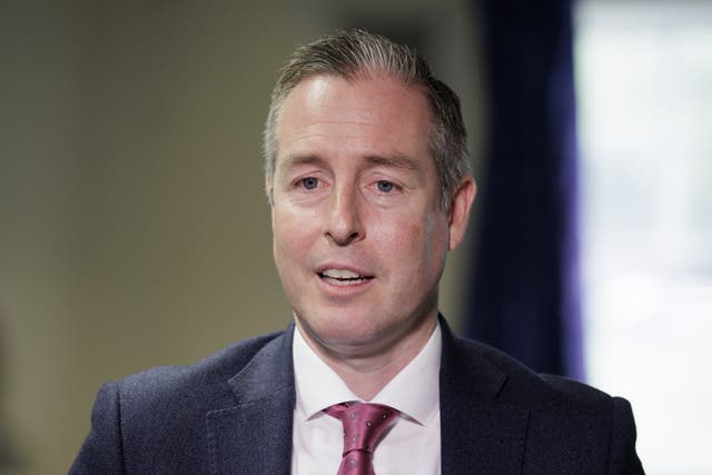 Education Minister Paul Givan has said risk assessments are to be carried out at schools close to where recent anti-immigration protests and racist attacks have taken place (Liam McBurney/PA)