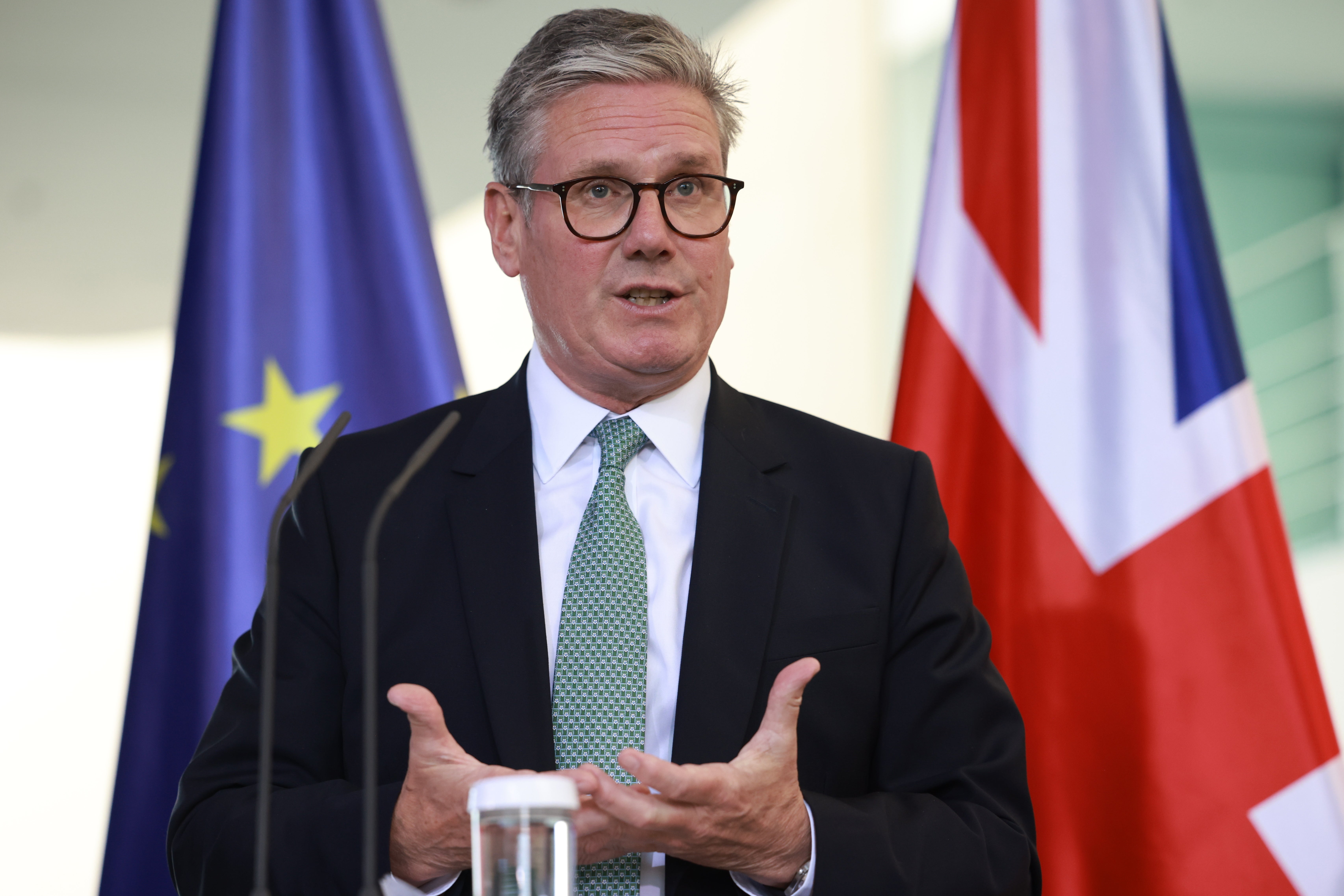 British Prime Minister Keir Starmer gestures as he speaks during a joint press conference with German Chancellor Olaf Scholz