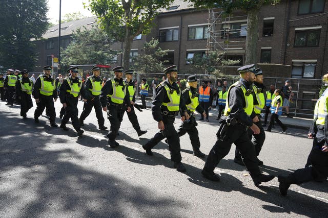 <p>Police officers during the Notting Hill Carnival</p>