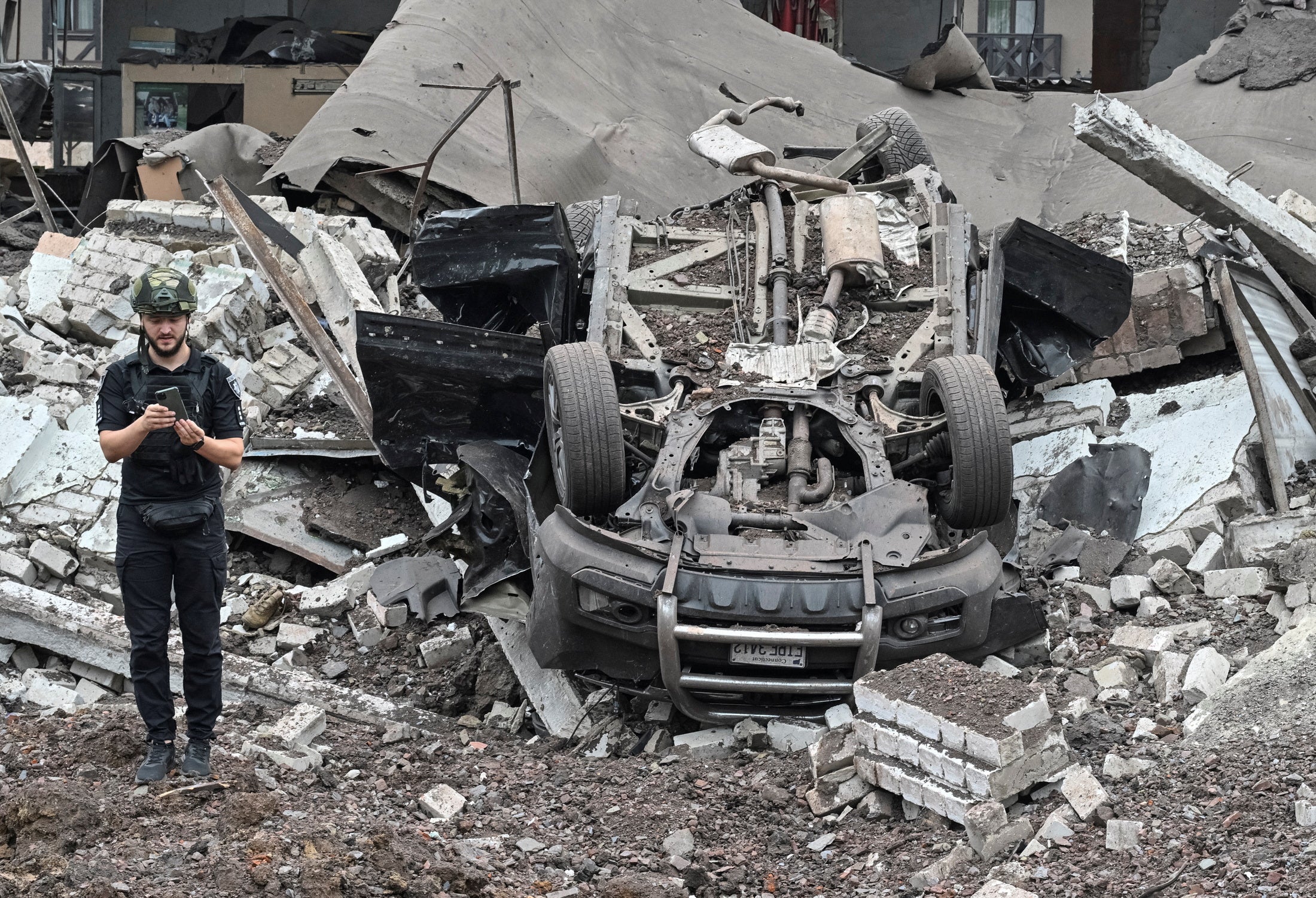 An overturned car in Kryvyi Rih after Putin launched a massive air attack on Ukraine earlier this week