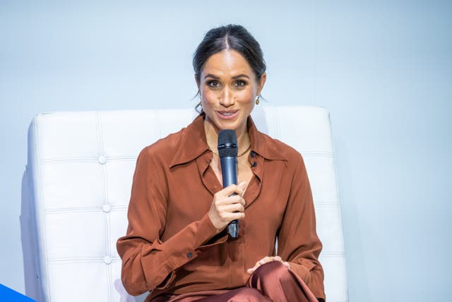 <p>Meghan, Duchess of Sussex, speaks onstage at EAN University</p>