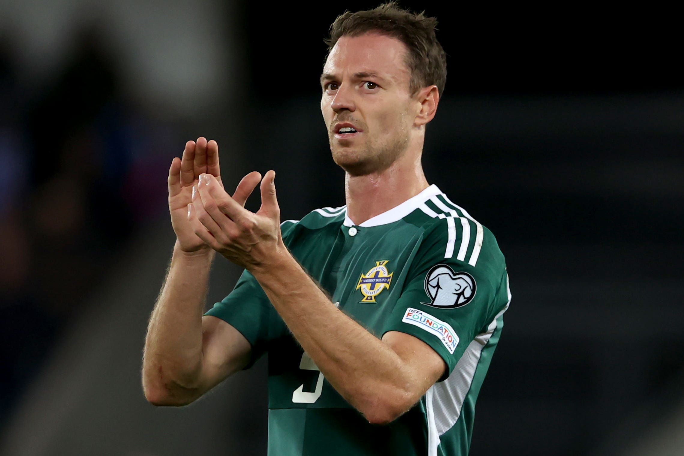 Northern Ireland defender Jonny Evans has announced his retirement from international football (Liam McBurney/PA)