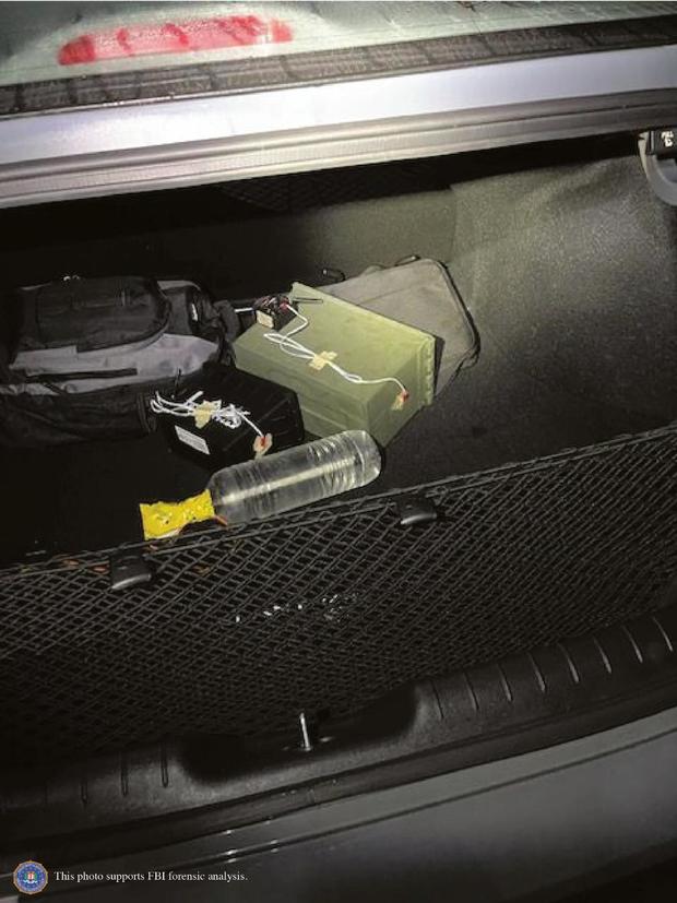 Two improvised explosive devices can be seen in the trunk of Thomas Matthew Crooks’ car