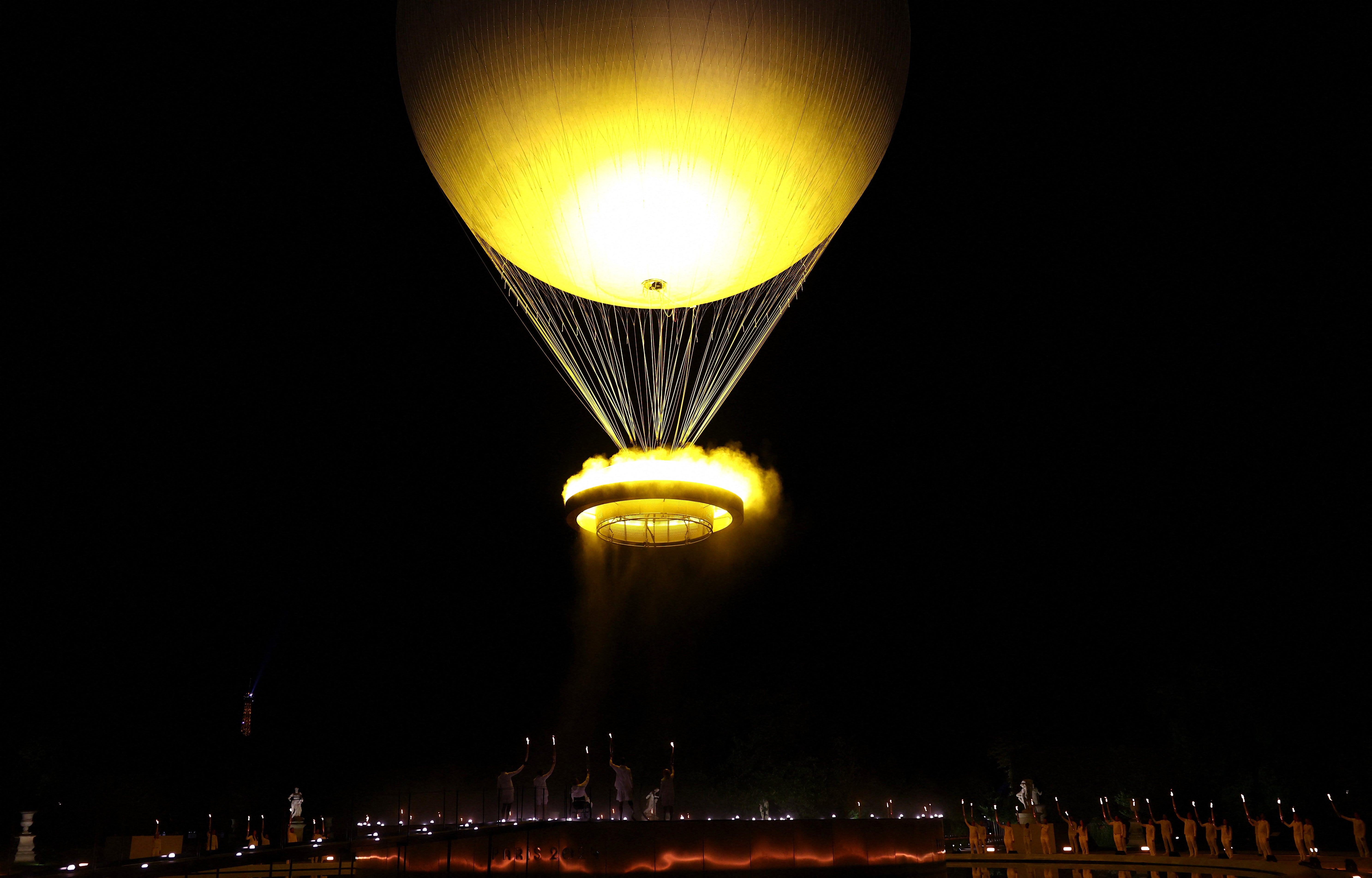 The Olympic cauldron was raised after being lit as part of the opening ceremony