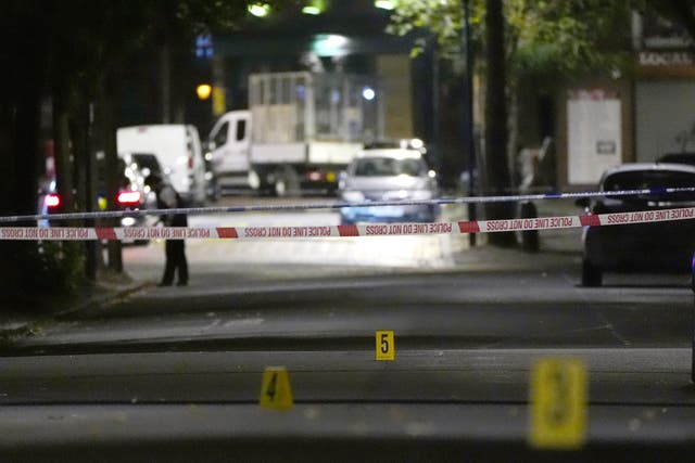 <p>Crime scene markers on Overbury Street near the scene in Rushmore Road, Clapton. </p>