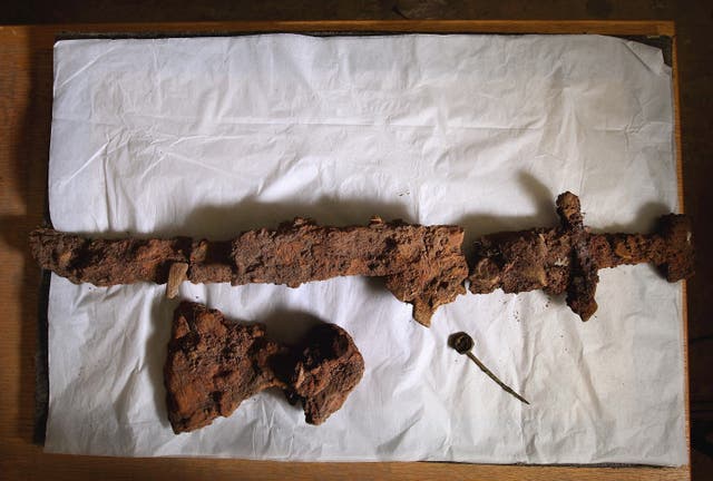 <p>Viking sword, axe head and bronze ring pin on display at viewing in CFA Archaeology</p>