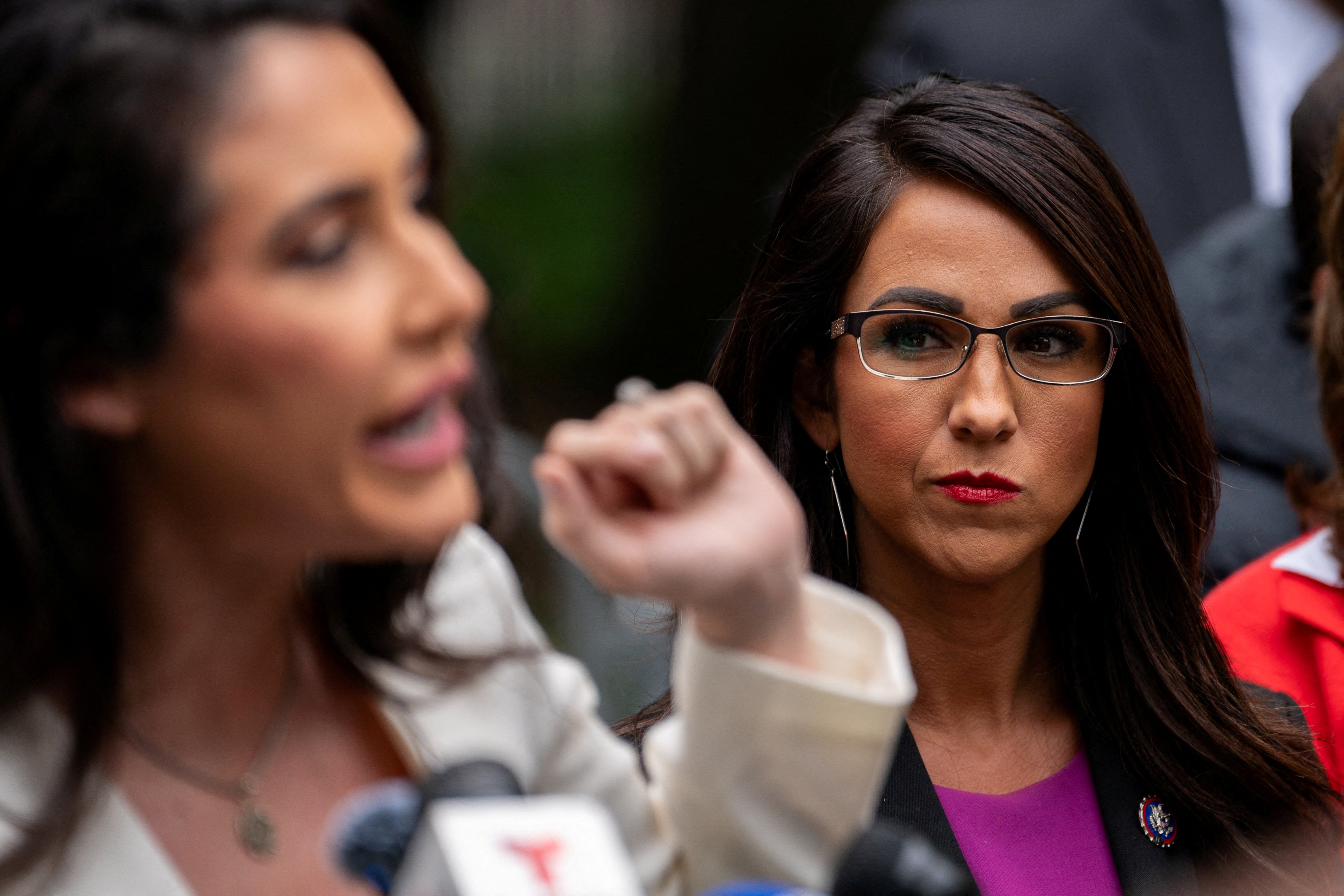 Lauren Boeber attends a press conference after attending Donald Trump's hush money trial in May 2024. Now she is being called to a debate in the theater where her Beetlejuice scandal unfolded