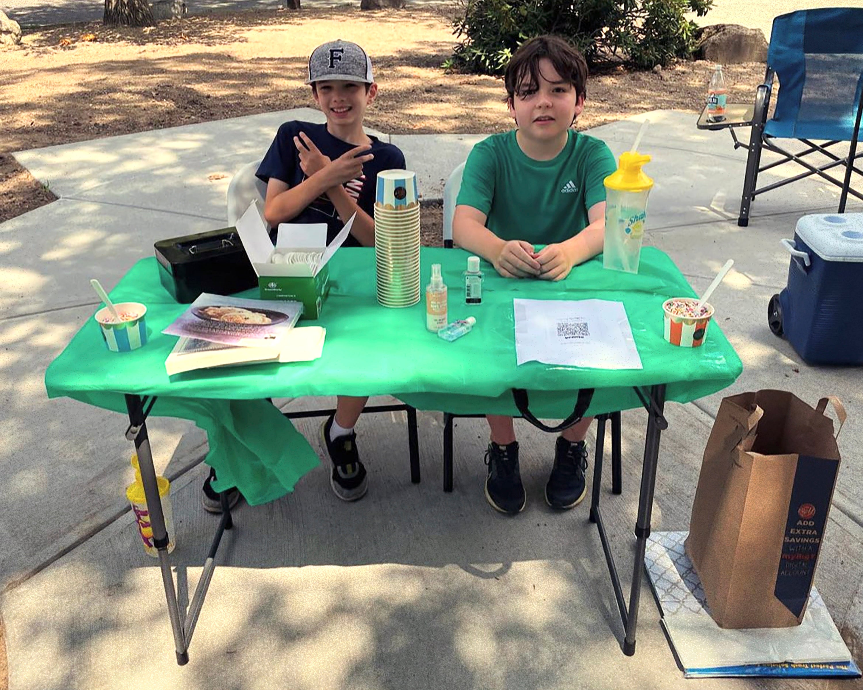 Ben Doherty and his cousin Danny Doherty promoting their homemade ice cream in Norwood on August 3