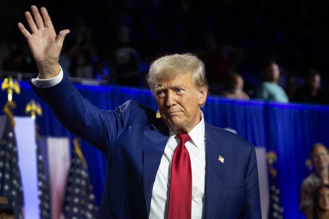 <p>Donald Trump greets supporters following his campaign speech in Wisconsin on Thursday</p>