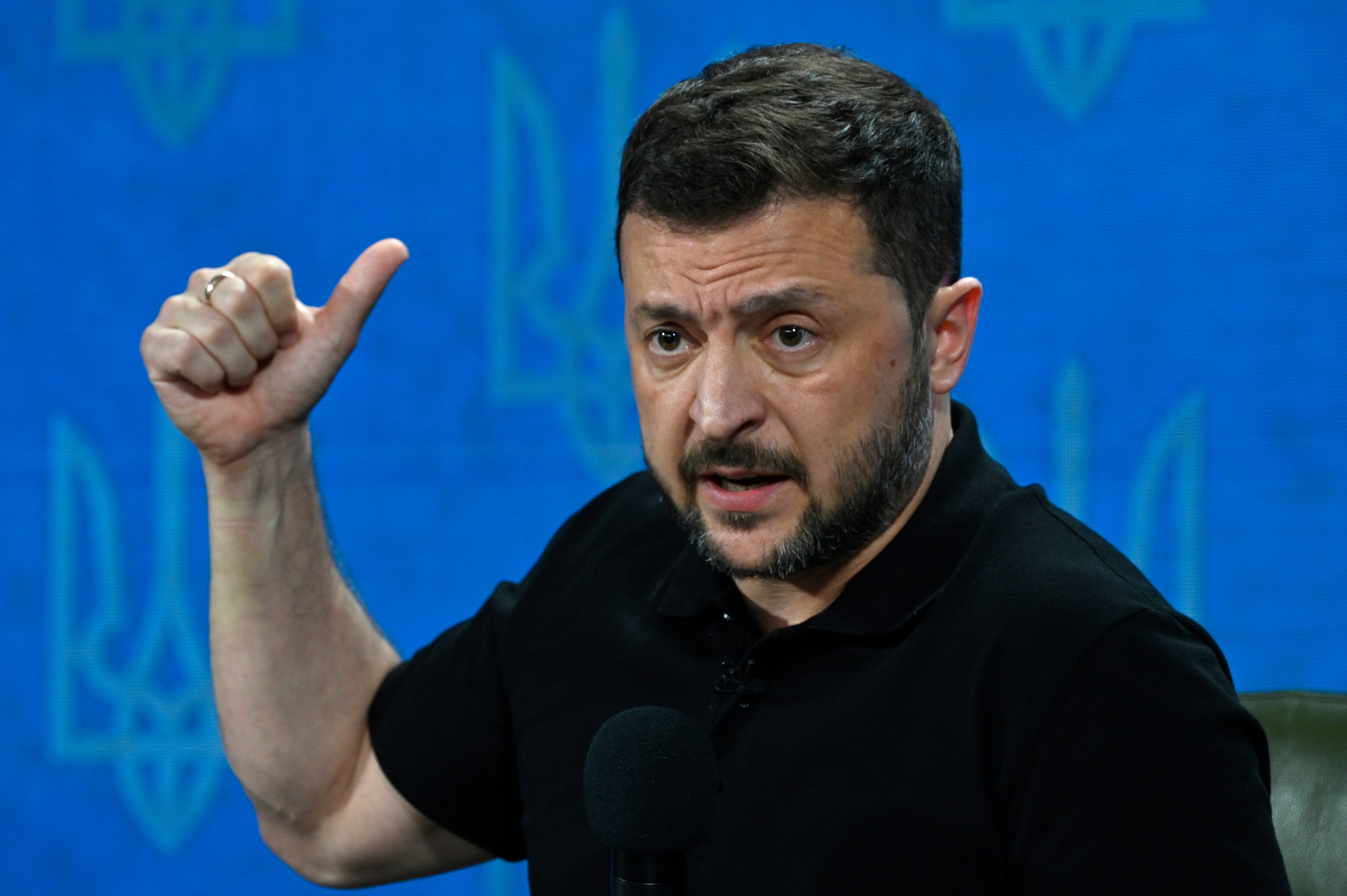 Ukraine’s president Volodymyr Zelensky gestures as he speaks during a joint press conference in Kyiv, on 27 August 2024