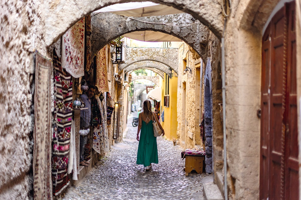 Explore the narrow streets, dipping in and out of the stalls and tavernas you encounter