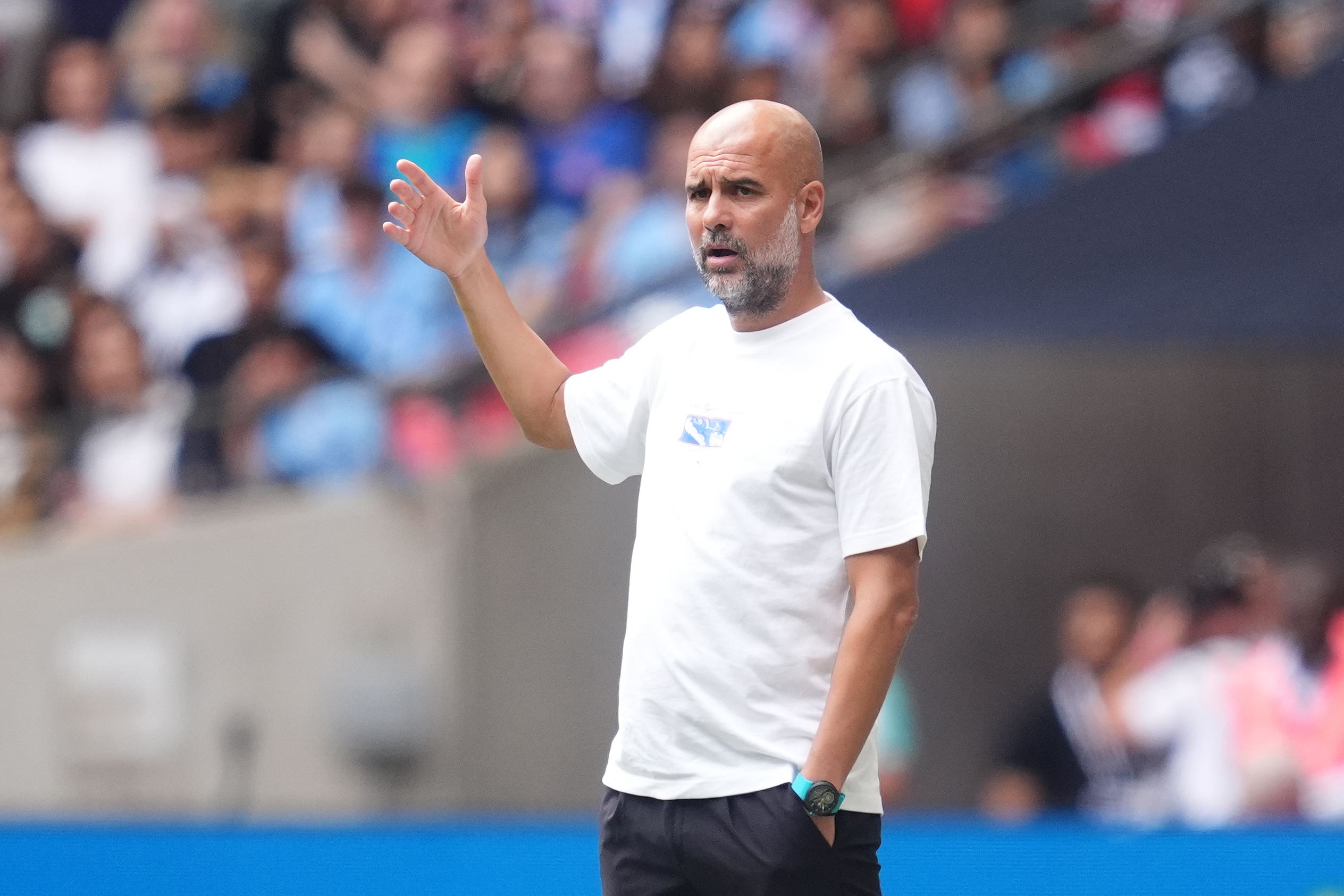 Pep Guardiola insisted he was happy with his Manchester City squad despite a quiet summer in the transfer market (Adam Davy/PA)