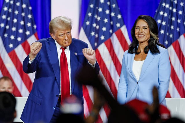 <p>Tulsi Gabbard, right, said Trump would “stay focused on the issues that matter the most” - he did not. </p>