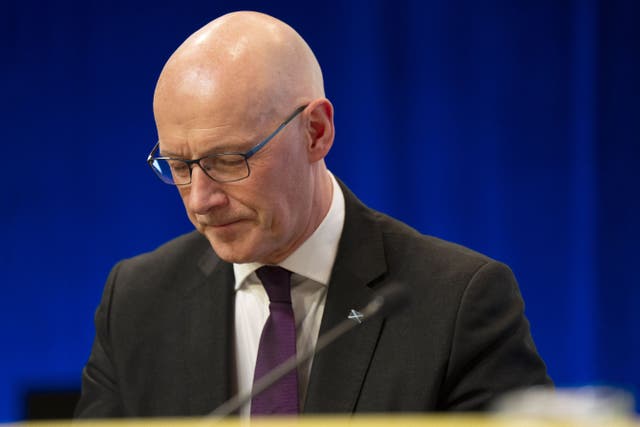 First Minister John Swinney (Jane Barlow/PA)