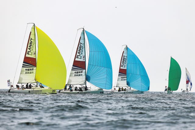 <p>Boats from various countries compete in the first Navy Cup International Sailing Regatta in Dalian, Liaoning province, in July</p>