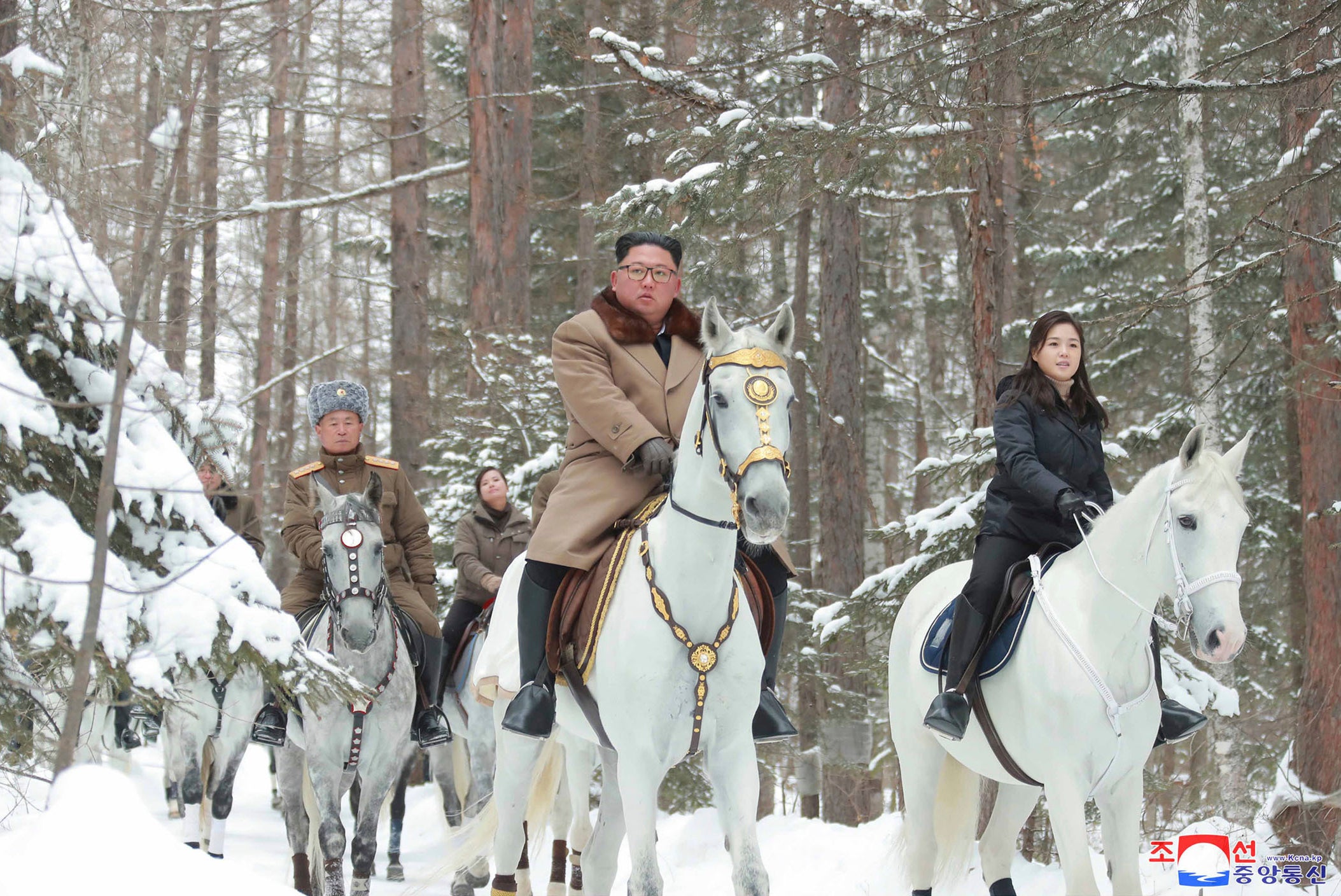 Kim Jong-un riding with his daughter Ju-ae during a visit to Mount Paektu, North Korea, in 2019