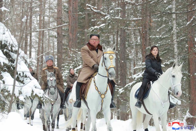 <p>Kim Jong-un riding with his daughter Ju-ae during a visit to Mount Paektu, North Korea, in 2019</p>