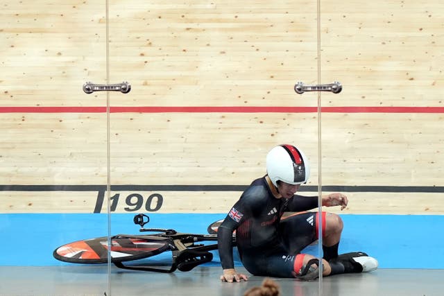 Great Britain’s Archie Atkinson crashes during the men’s C4 4000m individual pursuit final (Zac Goodwin/PA)