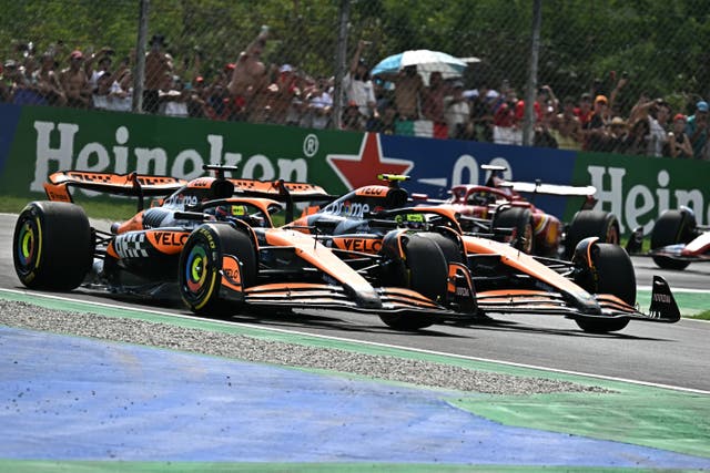 <p>McLaren’s Oscar Piastri overtakes teammate Lando Norris on lap one at Monza</p>