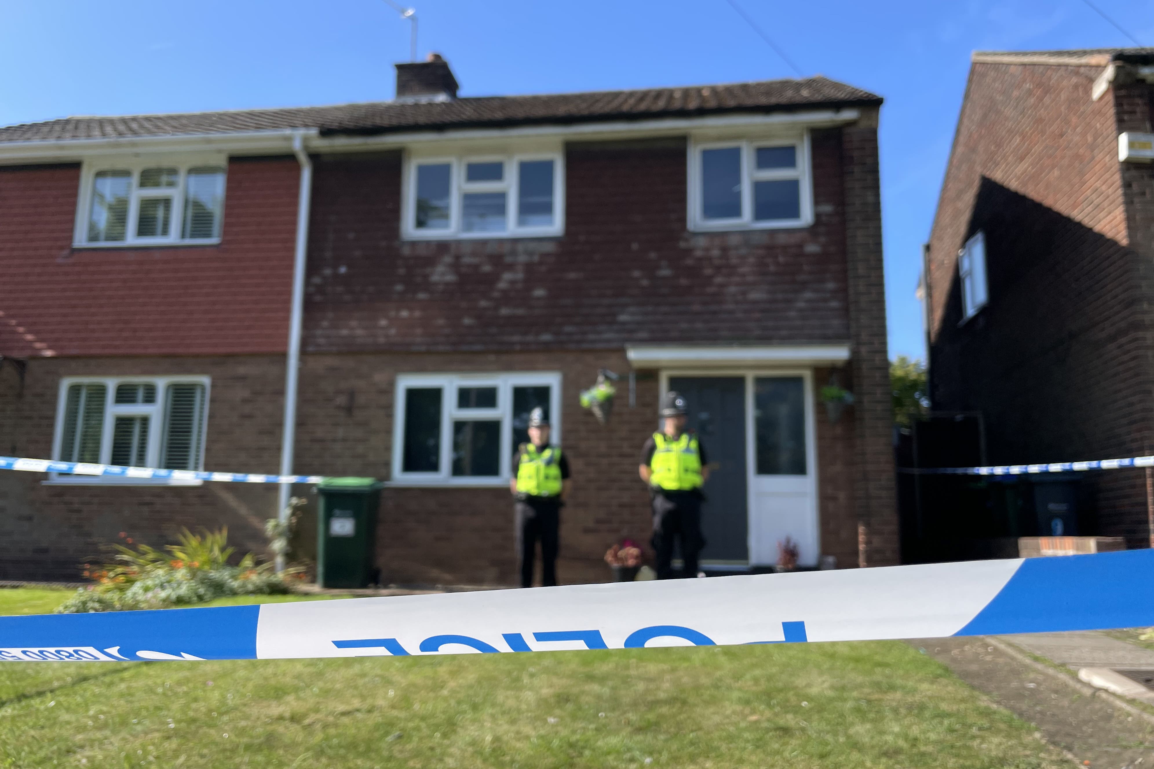 Police officers at the scene in Lovett Avenue, Oldbury