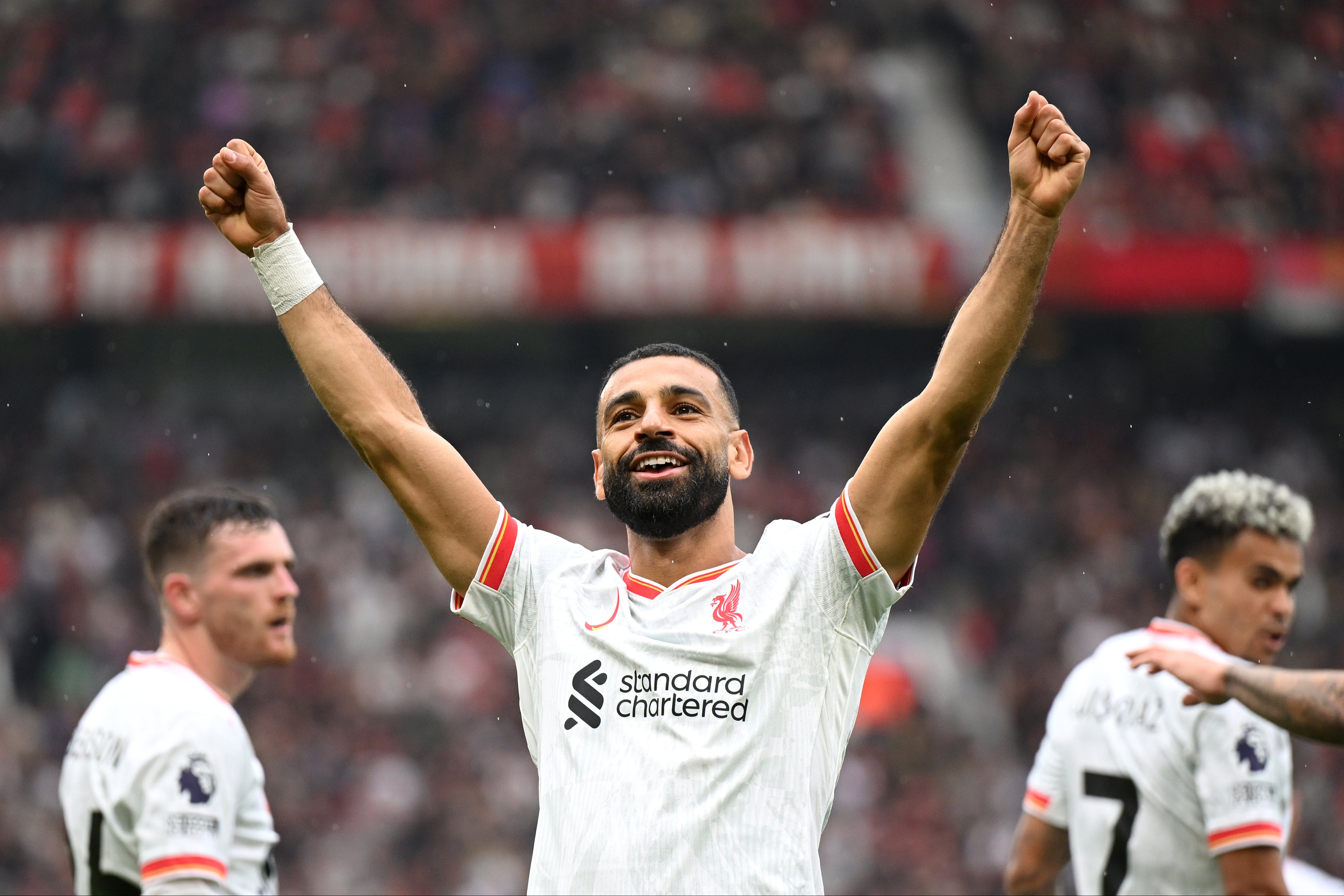 Mohamed Salah celebrates scoring Liverpool’s third goal