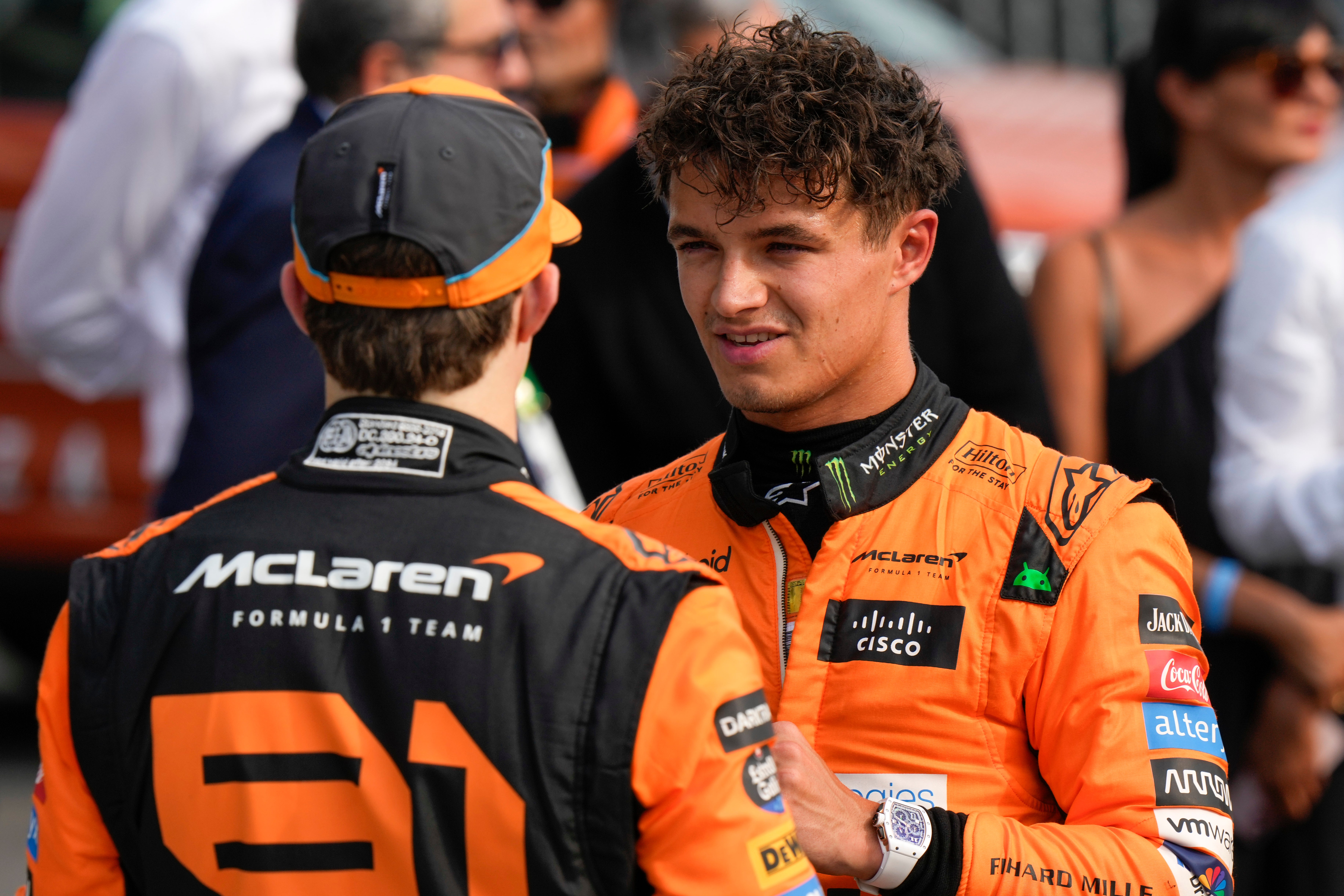 Norris (right) has challenged McLaren to make him their undisputed number one driver