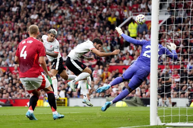 Liverpool’s Luis Diaz, second left, heads home his first goal in his side’s convincing win at Old Trafford (Nick Potts/PA)