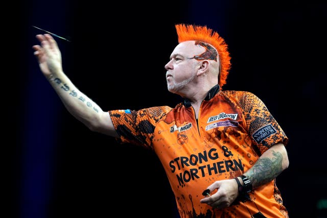 Peter Wright staged a stunning fight back to beat Luke Littler in Hildesheim (Martin Rickett/PA)