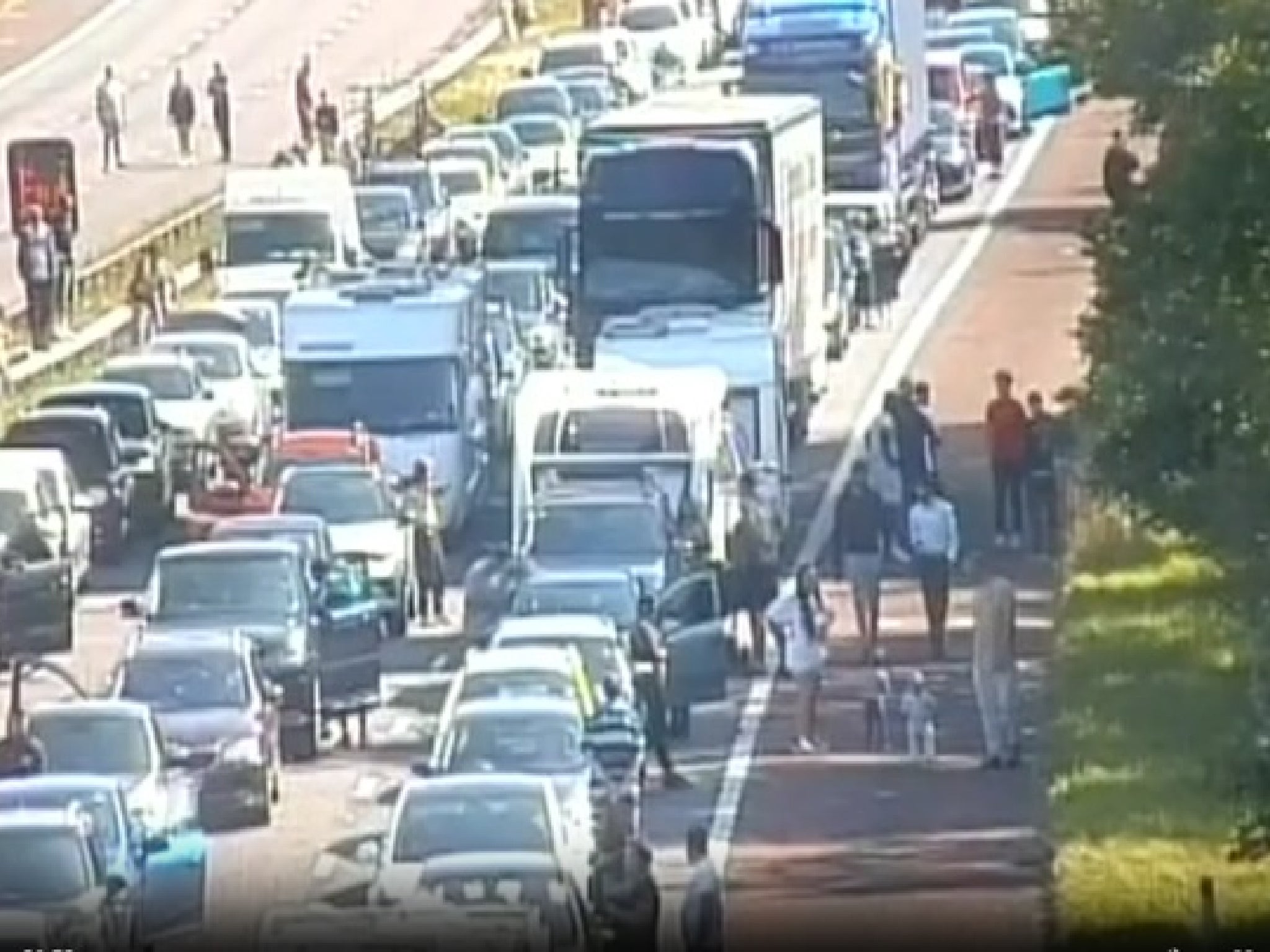 Young children were allowed to stand at the side of the M6 motorway