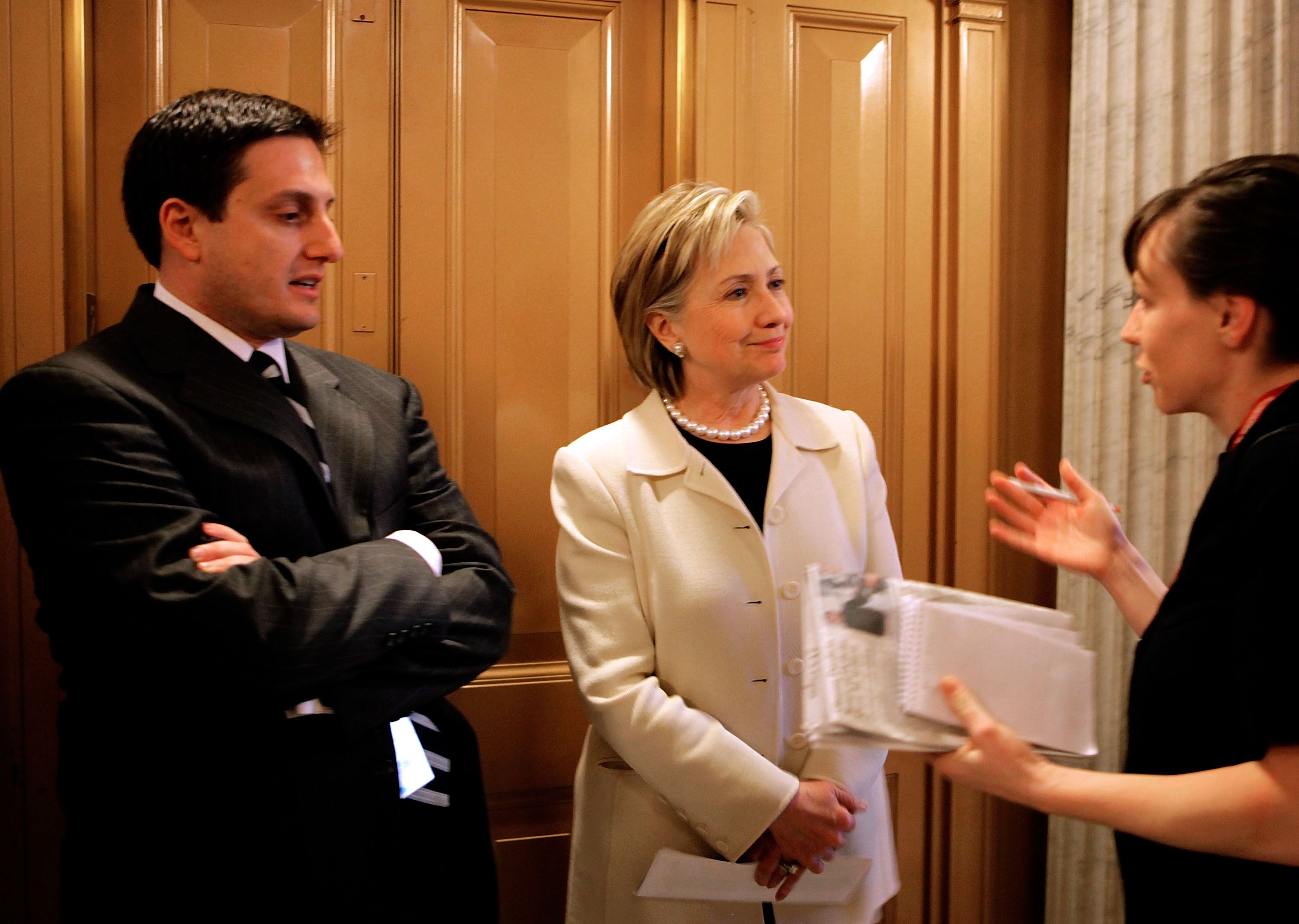 Then Secretary of State-designate and U.S. Senator Hillary Clinton waiting for an elevator with her press secretary Philippe Reines at the U.S. Capitol January 7, 2009 in Washington, DC.