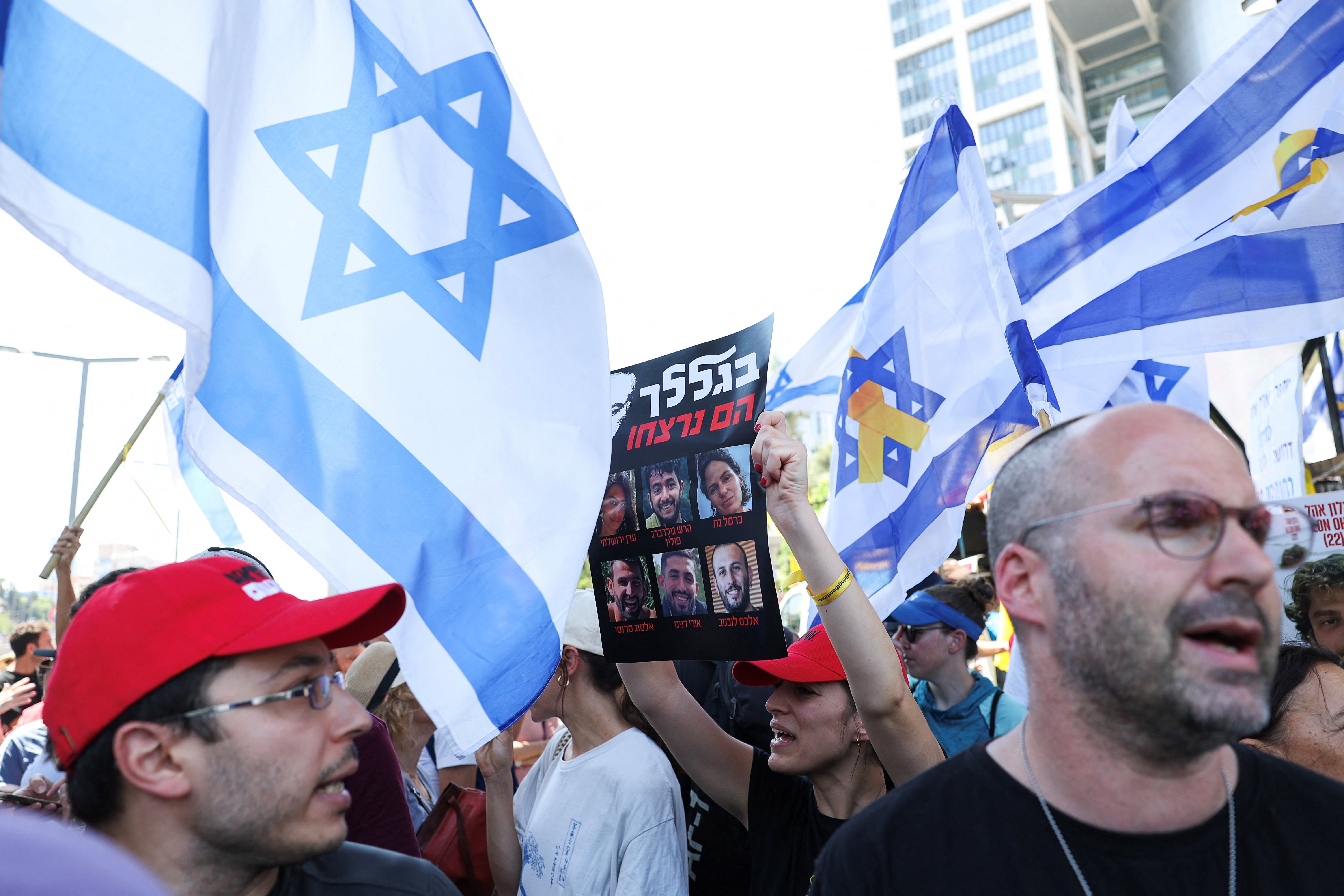 Demonstrators gather outside the Israeli defence ministry