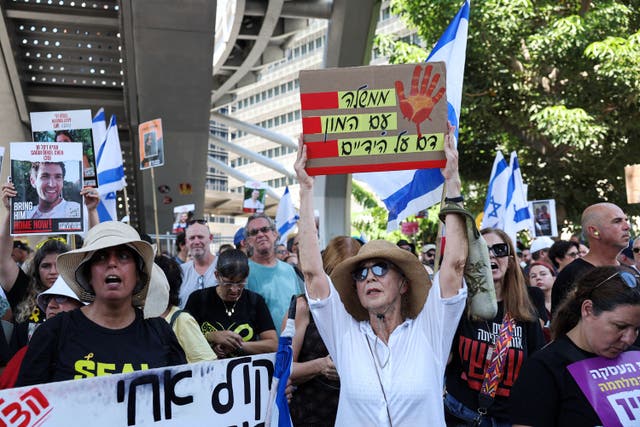 <p>Protesters rally together outside the Israel Defence Ministry</p>