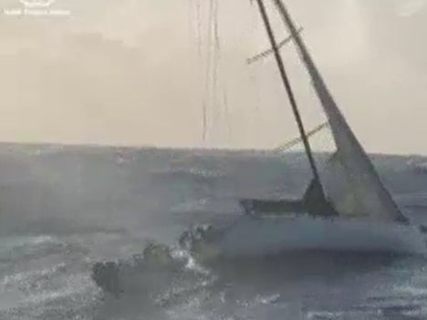 Sailors on Spirit of Mateship yacht being rescued on Tuesday