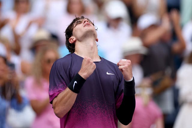 <p>Jack Draper celebrates after clinching a place in the final eight</p>