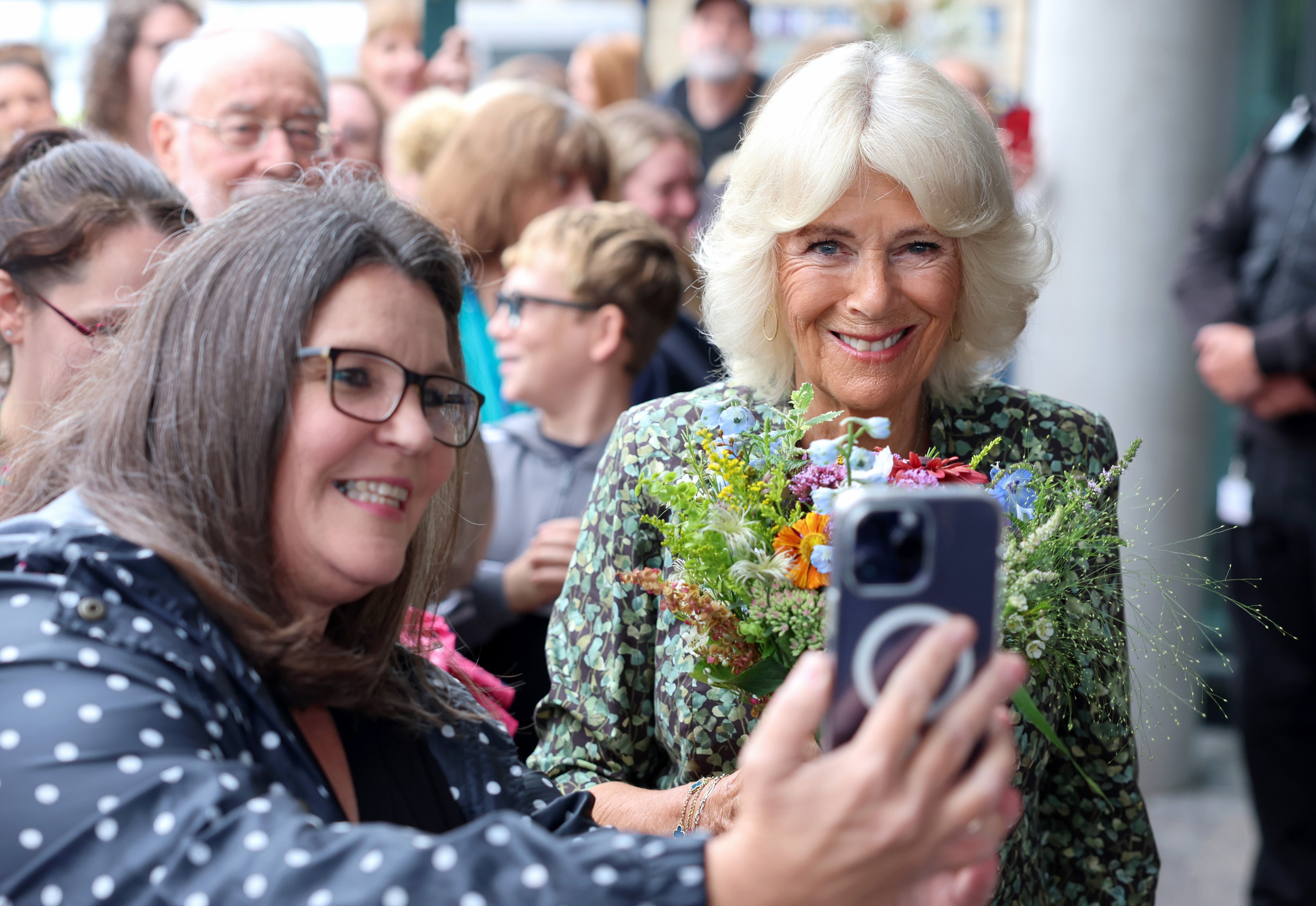 Queen Camilla posing for a picture.