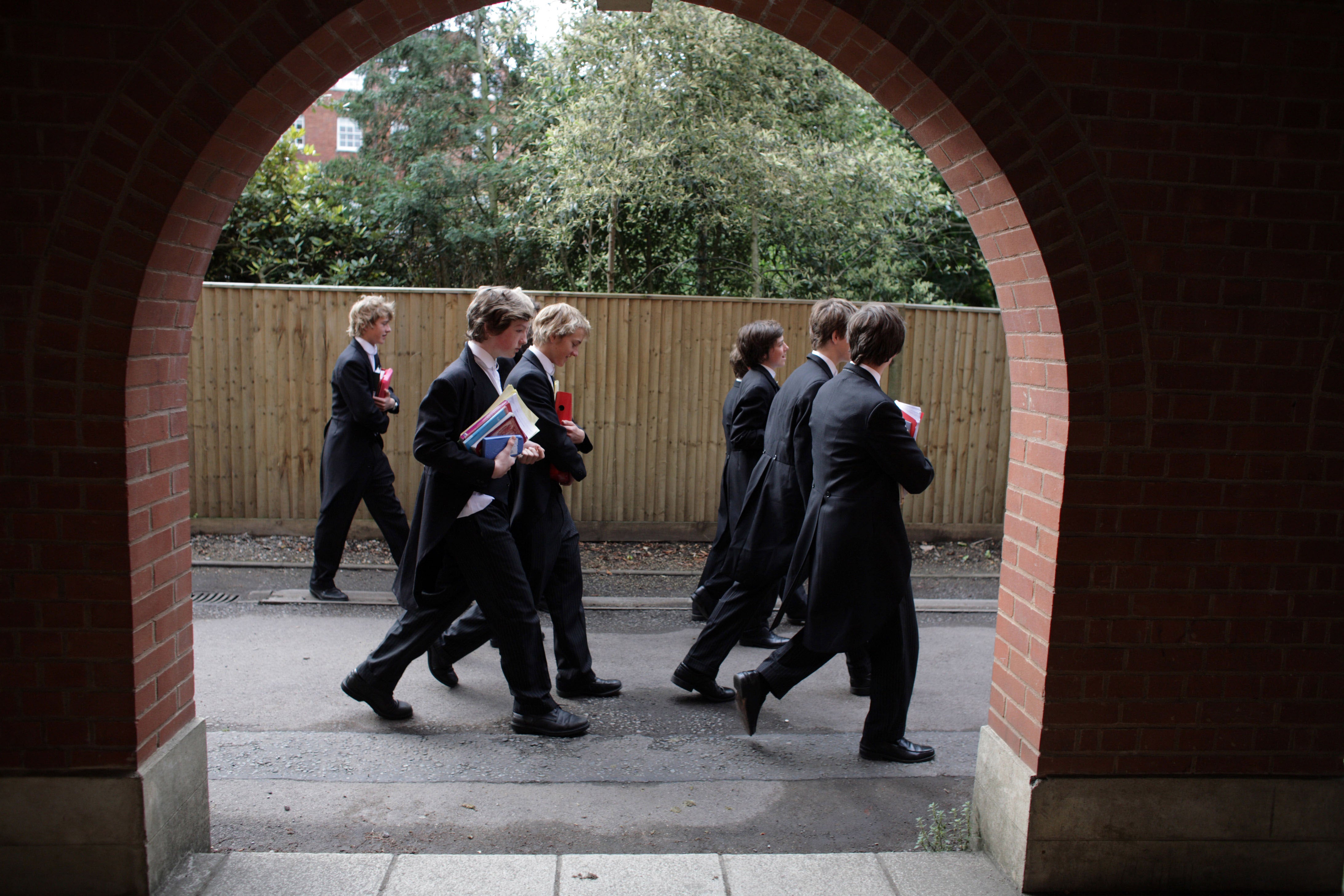 Boys make their way to classes at Eton College, where received pronunciation is the standard tongue