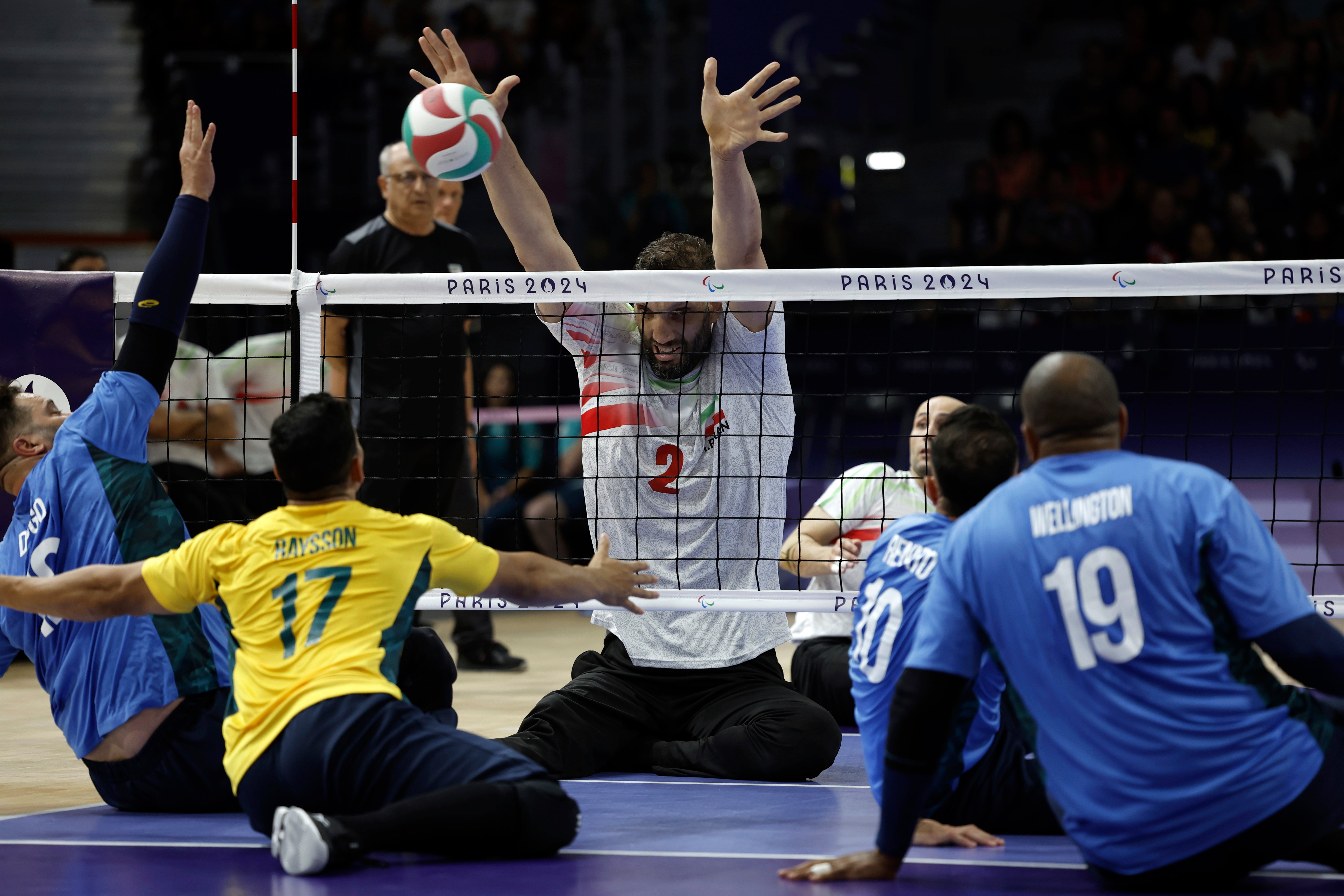 Iran’s Morteza Mehrzadselakjani blocks the ball at the Paralympic Games in Paris