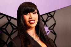 Cardi B explains why she posed in front of graffiti with word ‘pedophile’