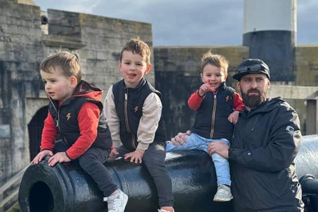 Two-year-old Nikodem Swiderski, three-year-old Dominik Swiderski, two-year-old Kacper Swiderski, and their father Piotr Swiderski, 31 (Family/Surrey Police/PA)