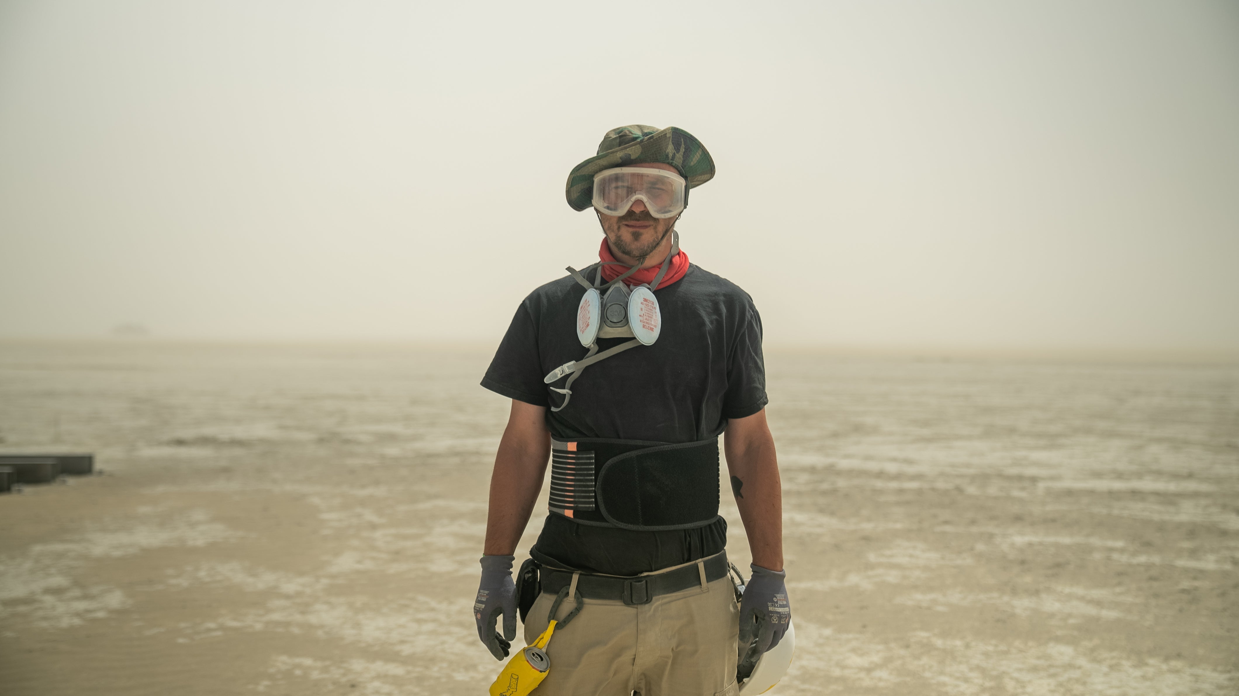 Ukrainian artist Oleksiy Sai during the installation of his ‘I’m Fine’ Sculpture, at Burning Man Festival in Black Rock Desert on August 23, 2024. Attendees leaving the festival on September 2, 2024, were caught in a dust storm and were left to sit in traffic for hours as a result