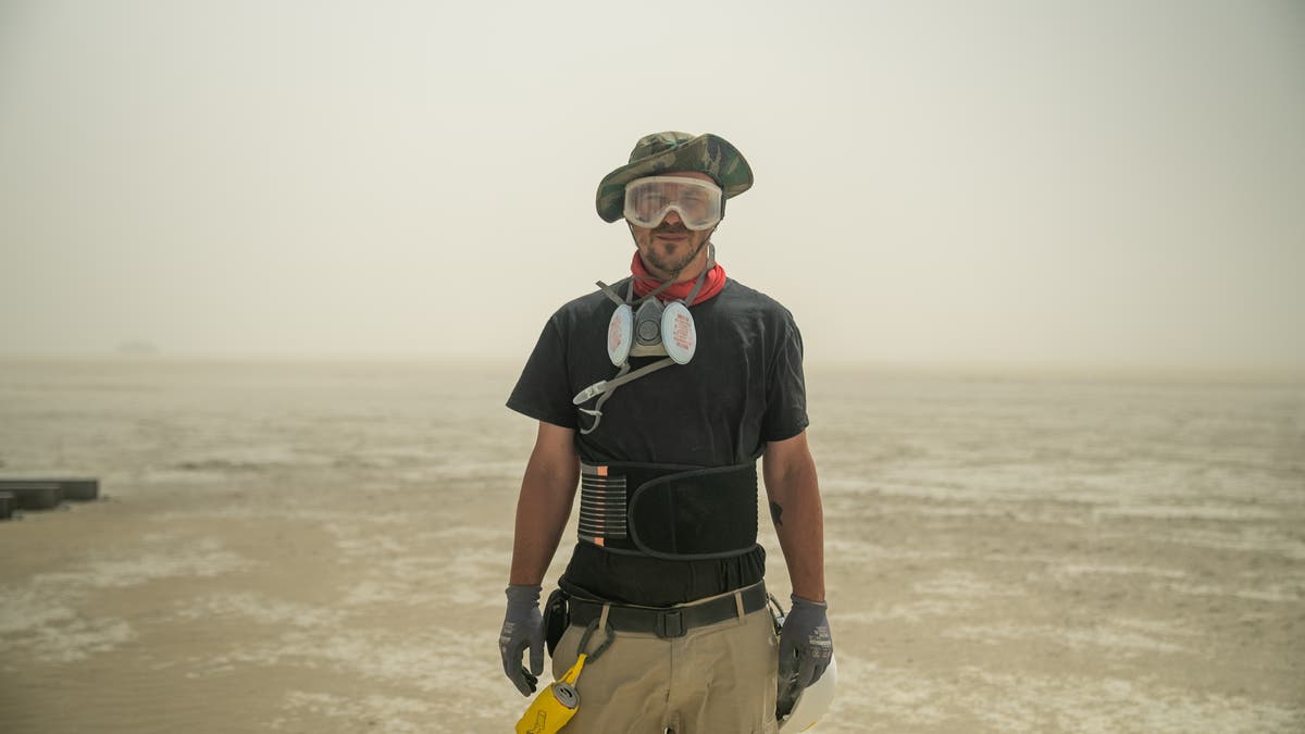 Burning Man attendees face raging dust storm as they wait hours to leave festival