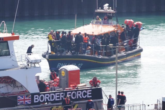 At least 12 migrants have died after their boat sank trying to cross the English Channel (Gareth Fuller/PA)