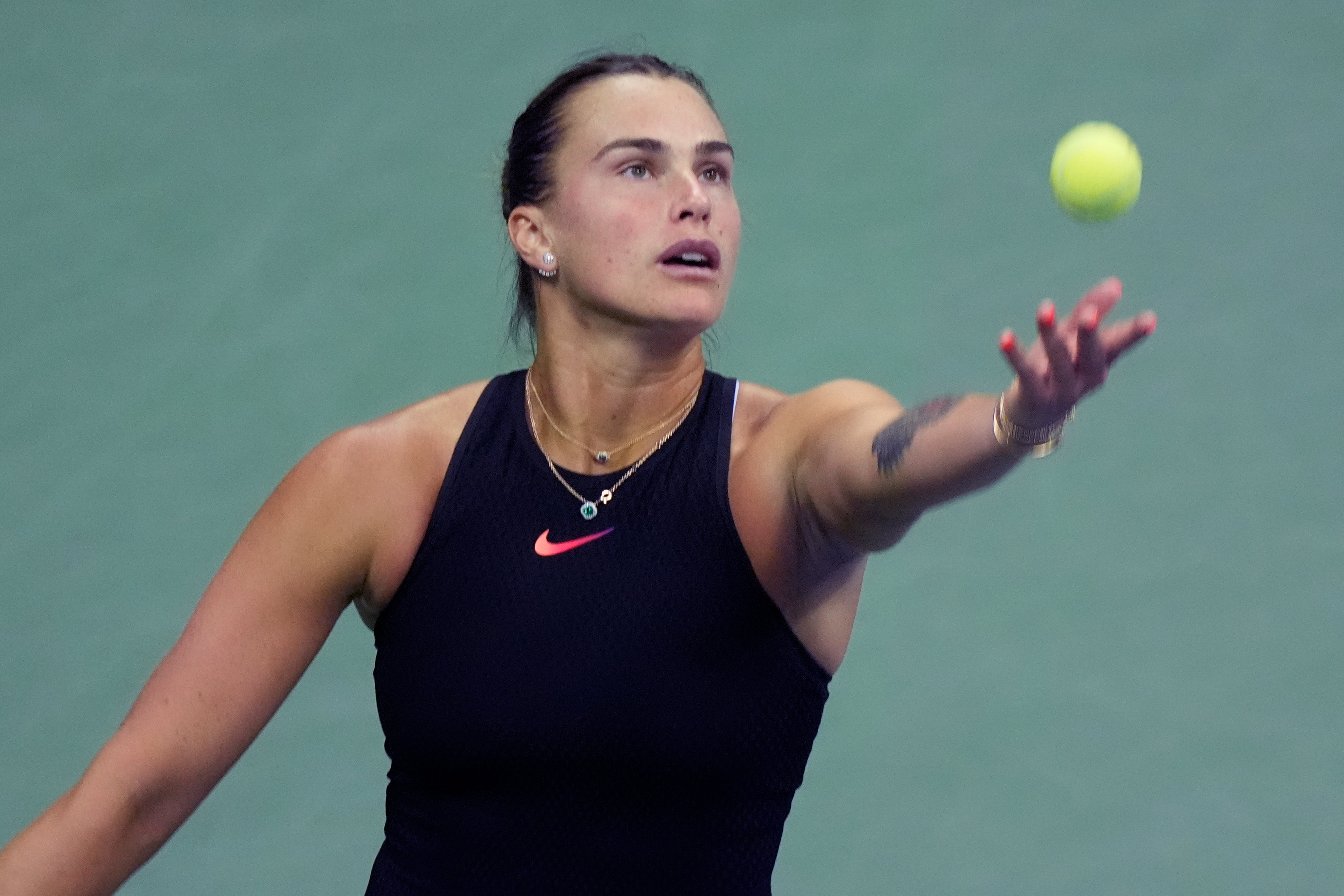 Aryna Sabalenka, of Belarus, serves to Zheng Qinwen, of China, during the quarterfinals of the U.S. Open tennis championships, Tuesday, Sept. 3, 2024, in New York. (AP Photo/Eduardo Munoz Alvarez)