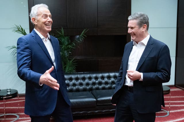 Sir Tony Blair (left) and Sir Keir Starmer discussing politics (Stefan Rousseau/PA)