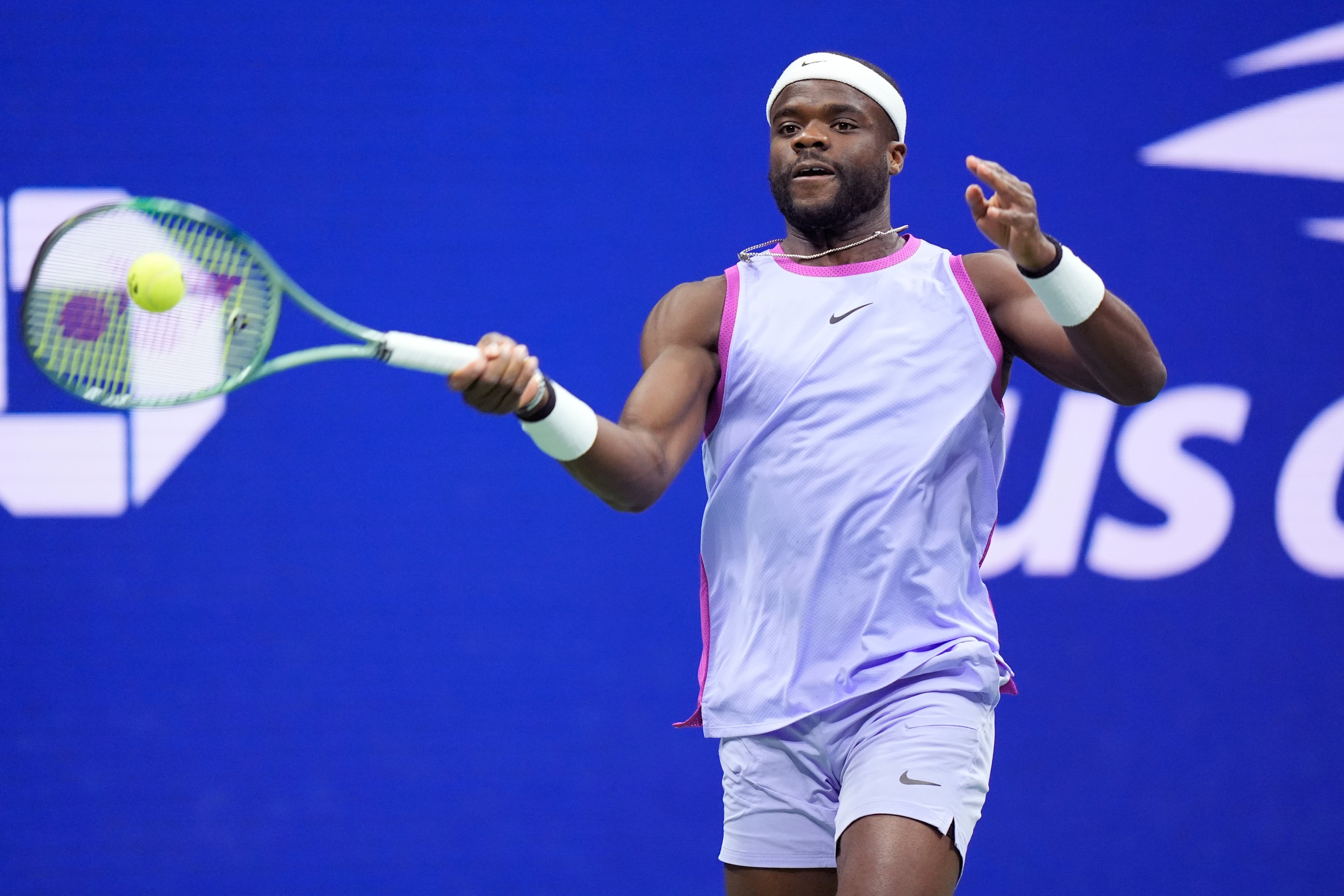 Frances Tiafoe, of the United States, returns to Grigor Dimitrov, of Bulgaria, during the quarterfinals of the U.S. Open tennis championships, Tuesday, Sept. 3, 2024, in New York