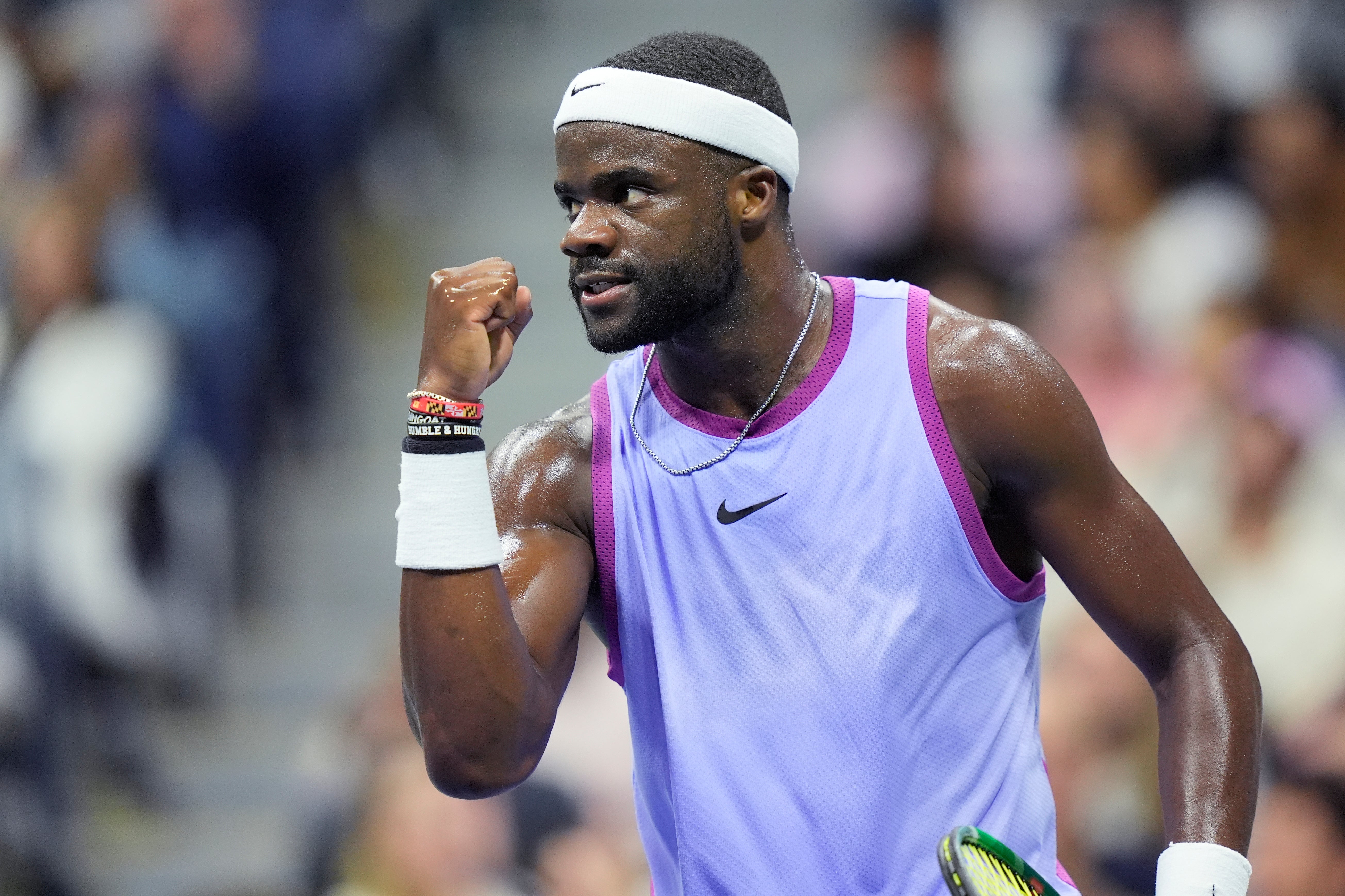 Frances Tiafoe, of the United States, reacts after winning a point against Grigor Dimitrov, of Bulgaria, during the quarterfinals of the U.S. Open tennis championships, Tuesday, Sept. 3, 2024, in New York. (AP Photo/Eduardo Munoz Alvarez)