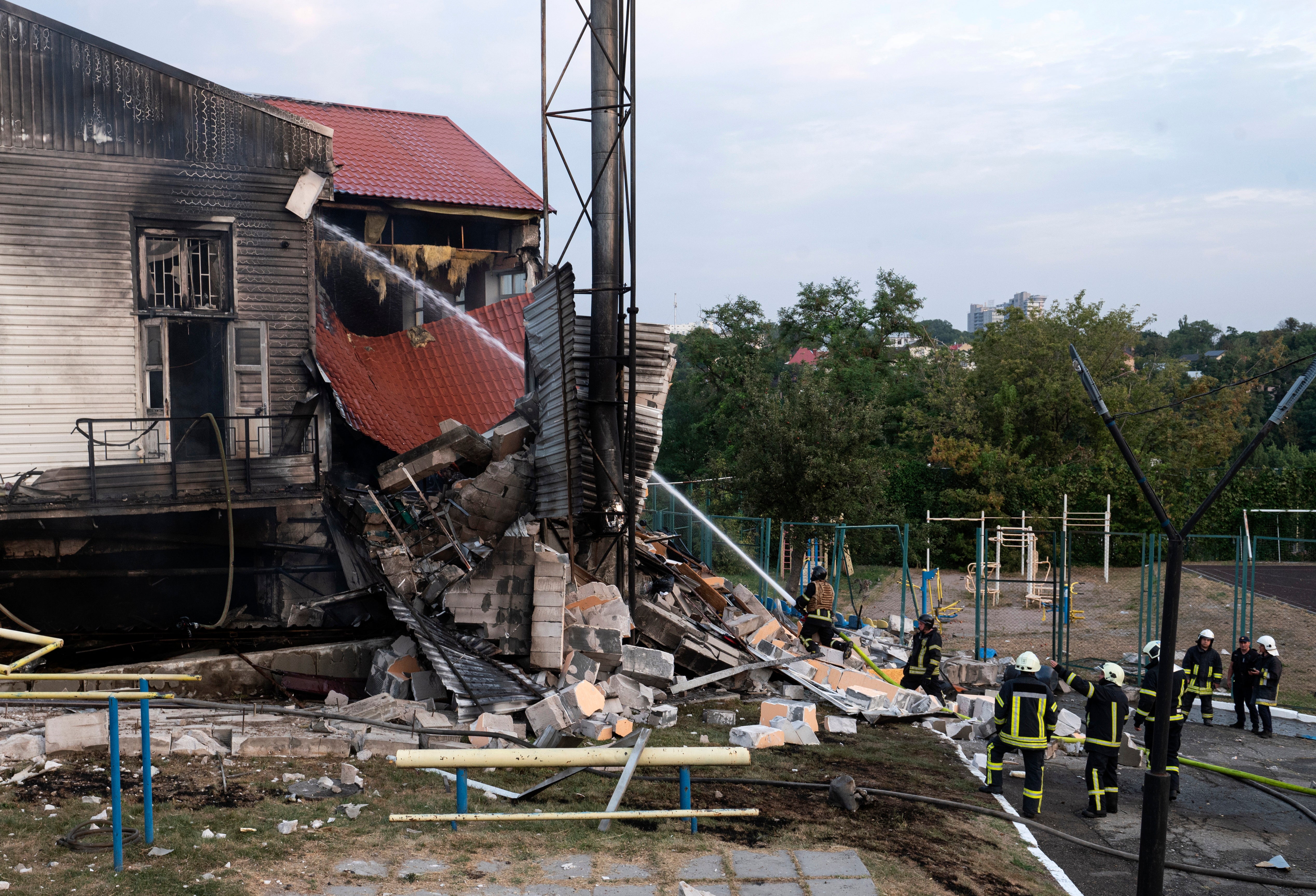 File: Ukrainian rescue workers work at the site of a rocket strike in Kyiv, Ukraine, September 02, 2024, amid the ongoing Russian invasion